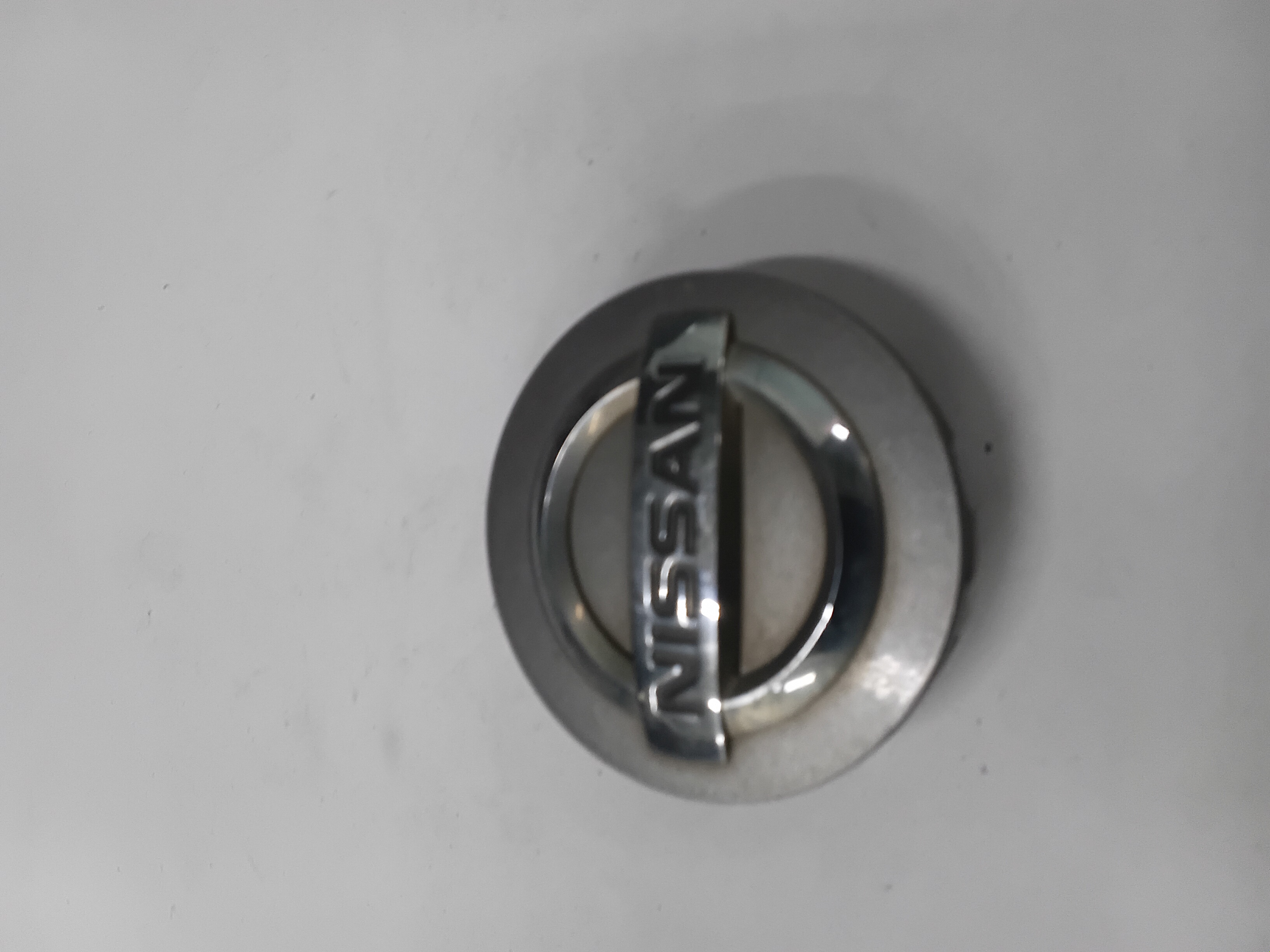 Center Cap — 2004–2011 Nissan Titan