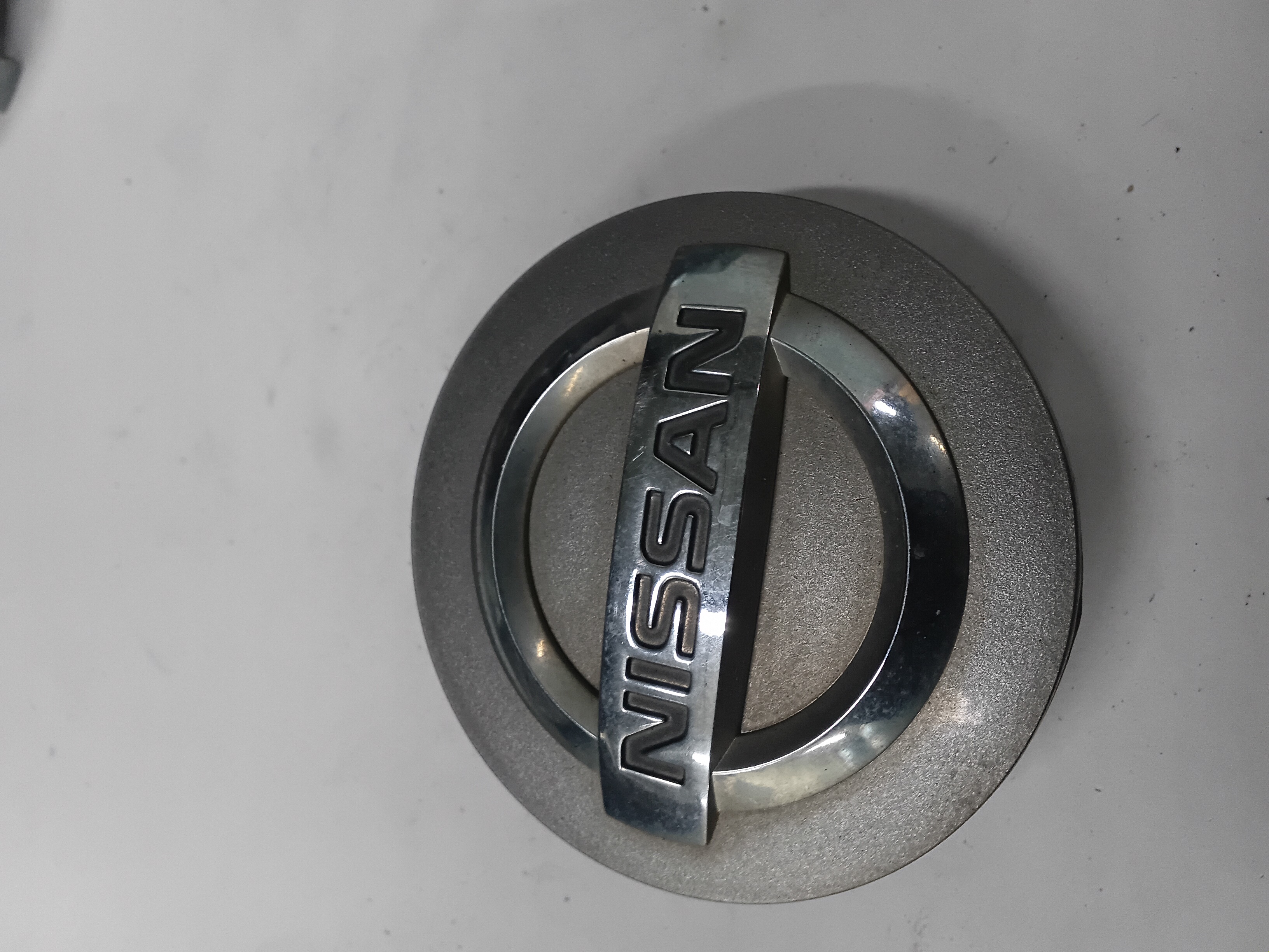 Center Cap — 2004–2011 Nissan Titan